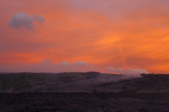 Sunrise and Rainbow over Lava Flow